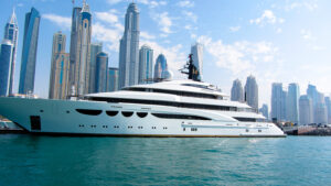 Yacht in dubai marina in front of high-rise buildings on 26th November 2016