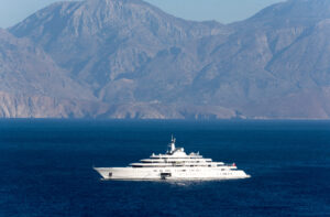 A super yacht at anchor on the Gulf of Mirabello off the Cretan town of Agios Nikolaos, Crete, Greece, October 2017