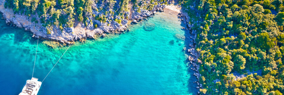 erial view of luxury large yacht anchored in turquoise bay of Mali Losinj island